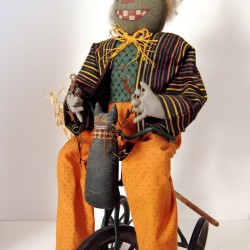 Vintage Primitive Folk Art HALLOWEEN GREEN WITCH on TRIKE by Sylvia Carlson.