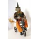 Vintage Primitive Folk Art HALLOWEEN GREEN WITCH on TRIKE by Sylvia Carlson.